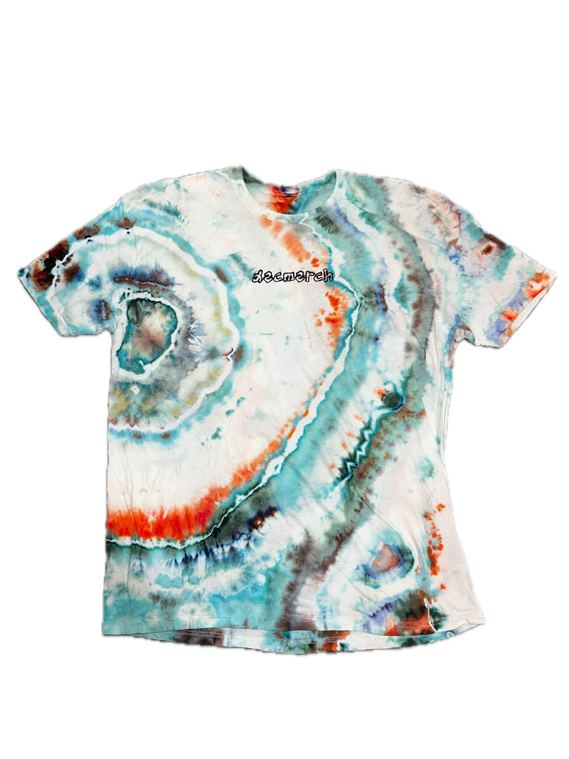 Dec Merch Fire and Water geode tee photographed against a white background
